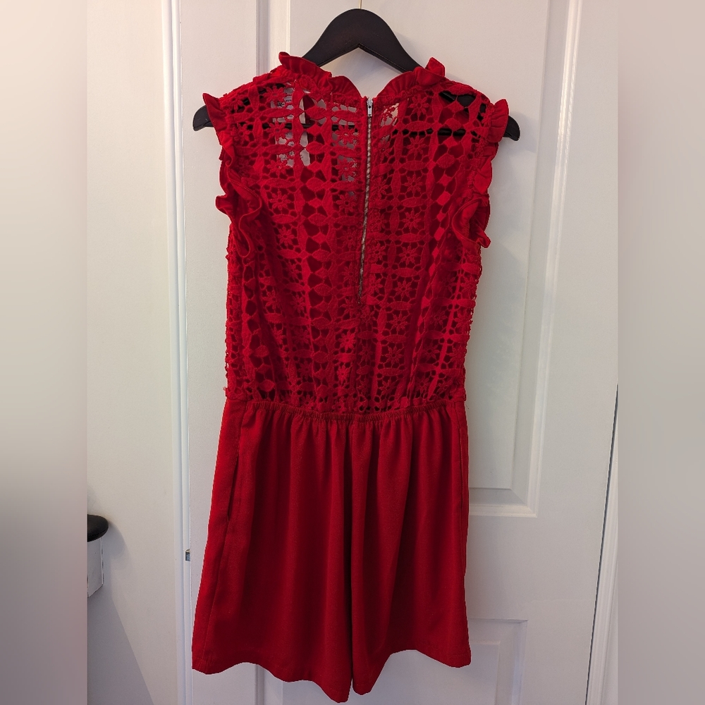 Red romper with shorts. Size L.
